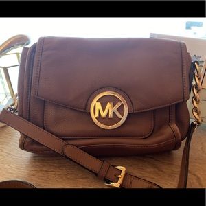 Camel MK crossbody with gold hardware